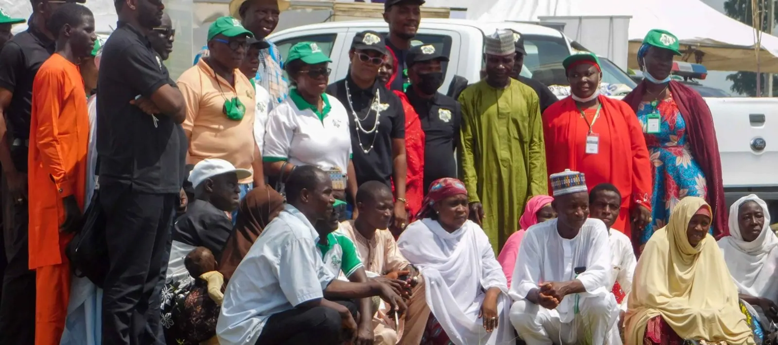 A state delegation with officials and community members gathered at a National Agricultural Show