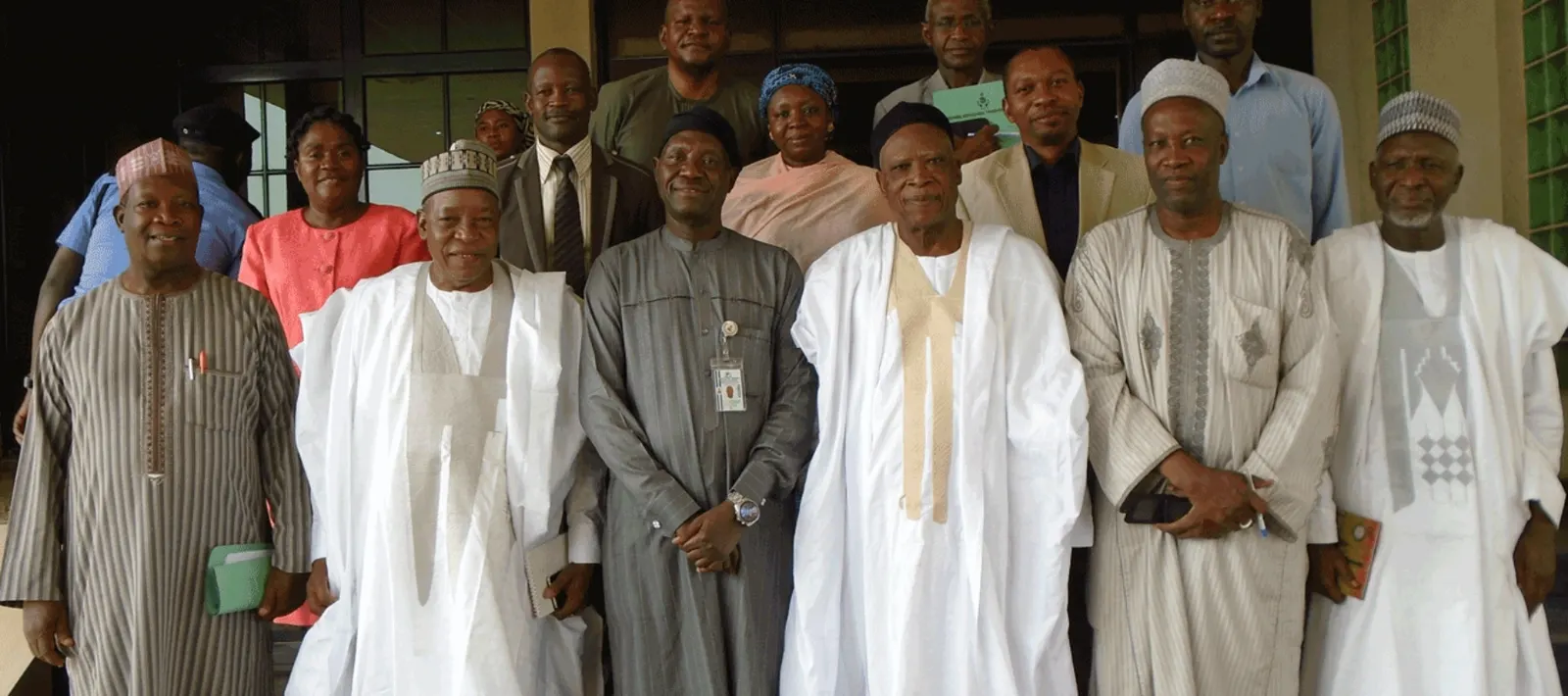 Federal and state officials posing together at a National Agricultural Show